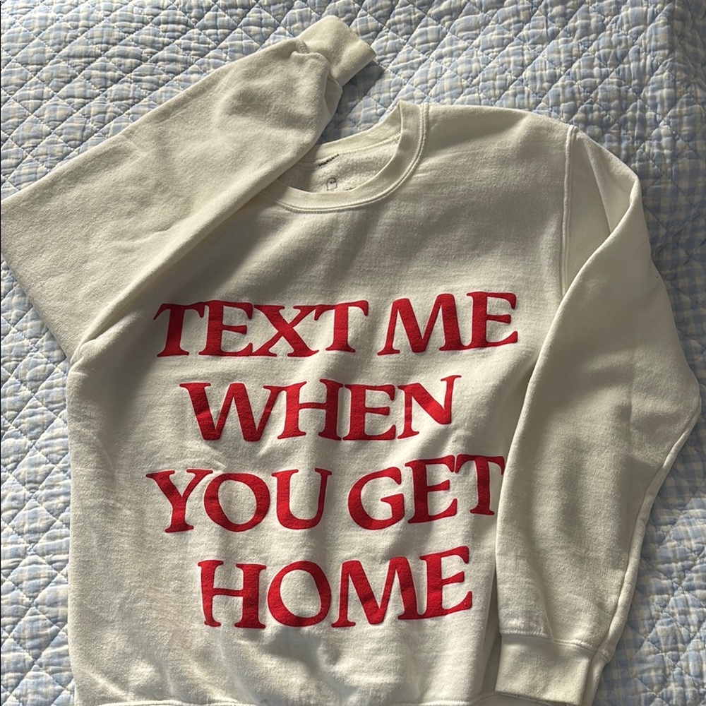 White Sweatshirt with Red Text